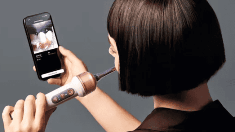 Dyson’s $499 AI-powered toothbrush features a built-in camera designed to track how you brush | ©Image Credit: Dyson 