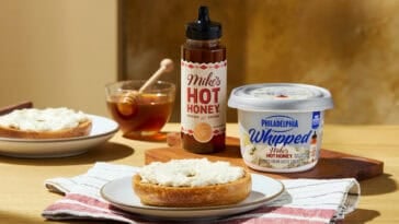 Philadelphia and Mike’s Hot Honey team up for a sweet-and-spicy whipped cream cheese made with real milk, cream, honey, and chili peppers. | ©Image Credit: Kraft Heinz Company