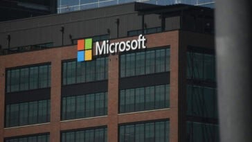 Microsoft offers voluntary buyouts to nearly 60,000 staff members as capital spending on artificial intelligence skyrockets. | ©Image Credit: Simon Ray / Unsplash