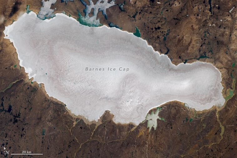 A satellite view of the Barnes Ice Cap on Baffin Island in Nunavut, Canada | ©Image Credit: NASA Earth Observatory / Landsat 9